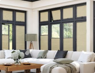 Picture of a conservatory with anthracite windows and perfect fit pleated blinds